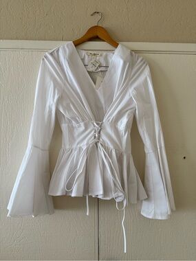 FREE GENERATION: White Lace Up Peplum Blouse with Flared Sleeves